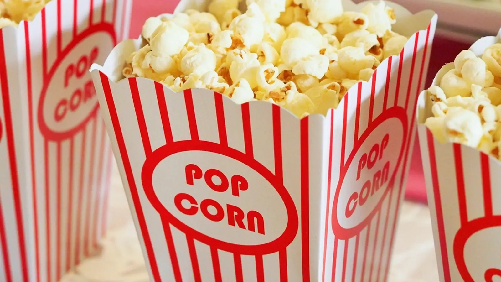 Striped paper boxes filled with popcorn
