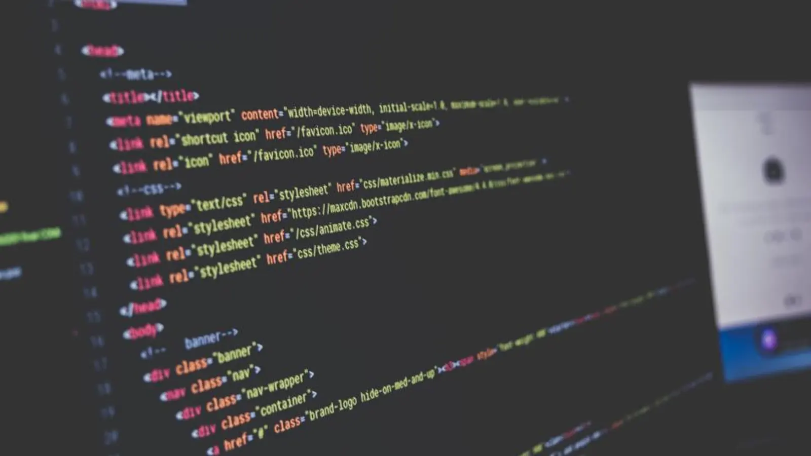 Lines of colourful code on a dark computer screen